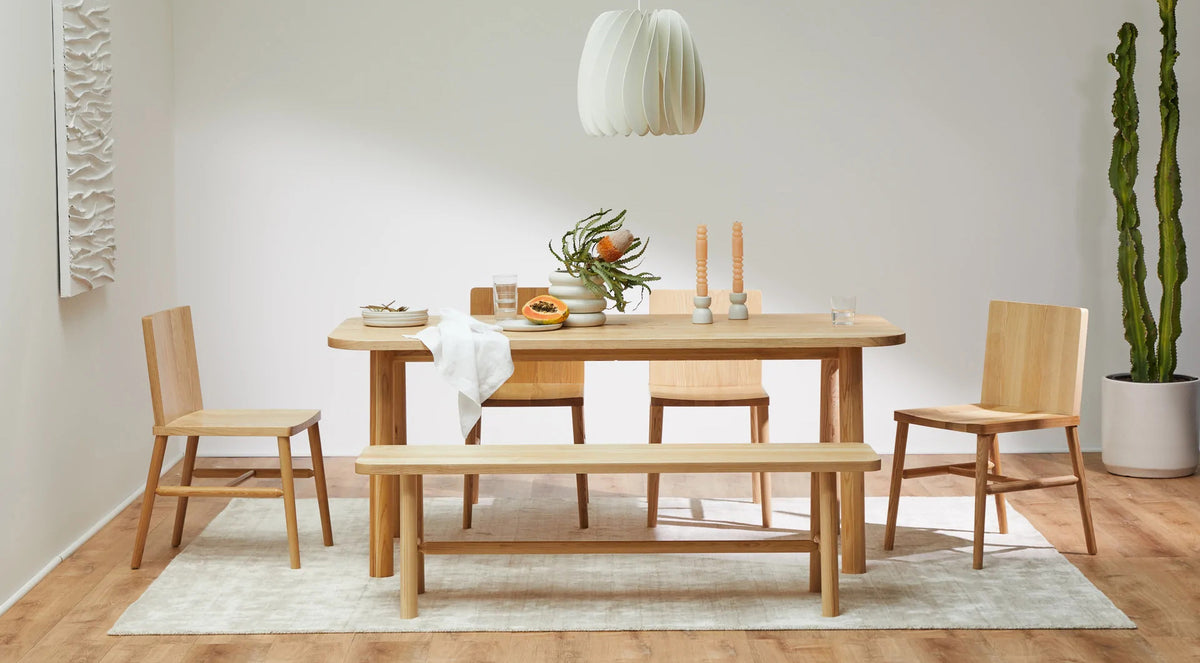 LAX Milk Dining Chair by MASHstudios, showing lax milk dining chairs in live shot.