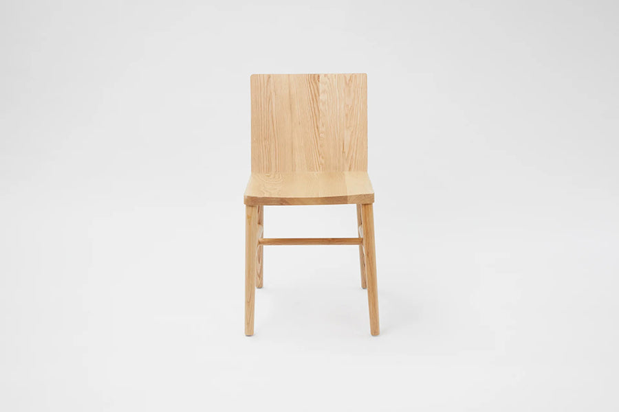 LAX Milk Dining Chair by MASHstudios, showing front view of lax milk dining chair in solid ash wood.