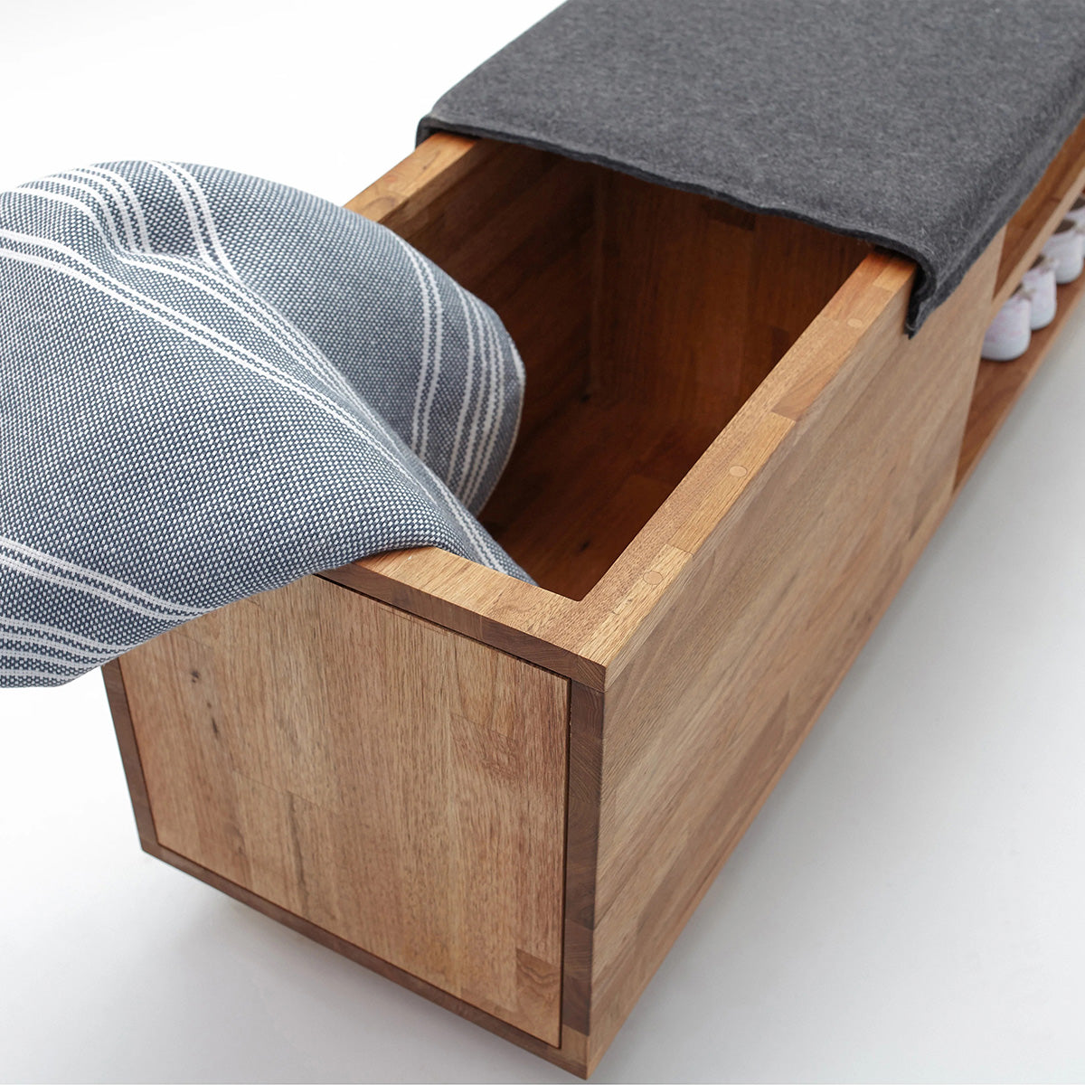 Storage Bench by MASHstudios, showing closeup view of lax storage bench in live shot.