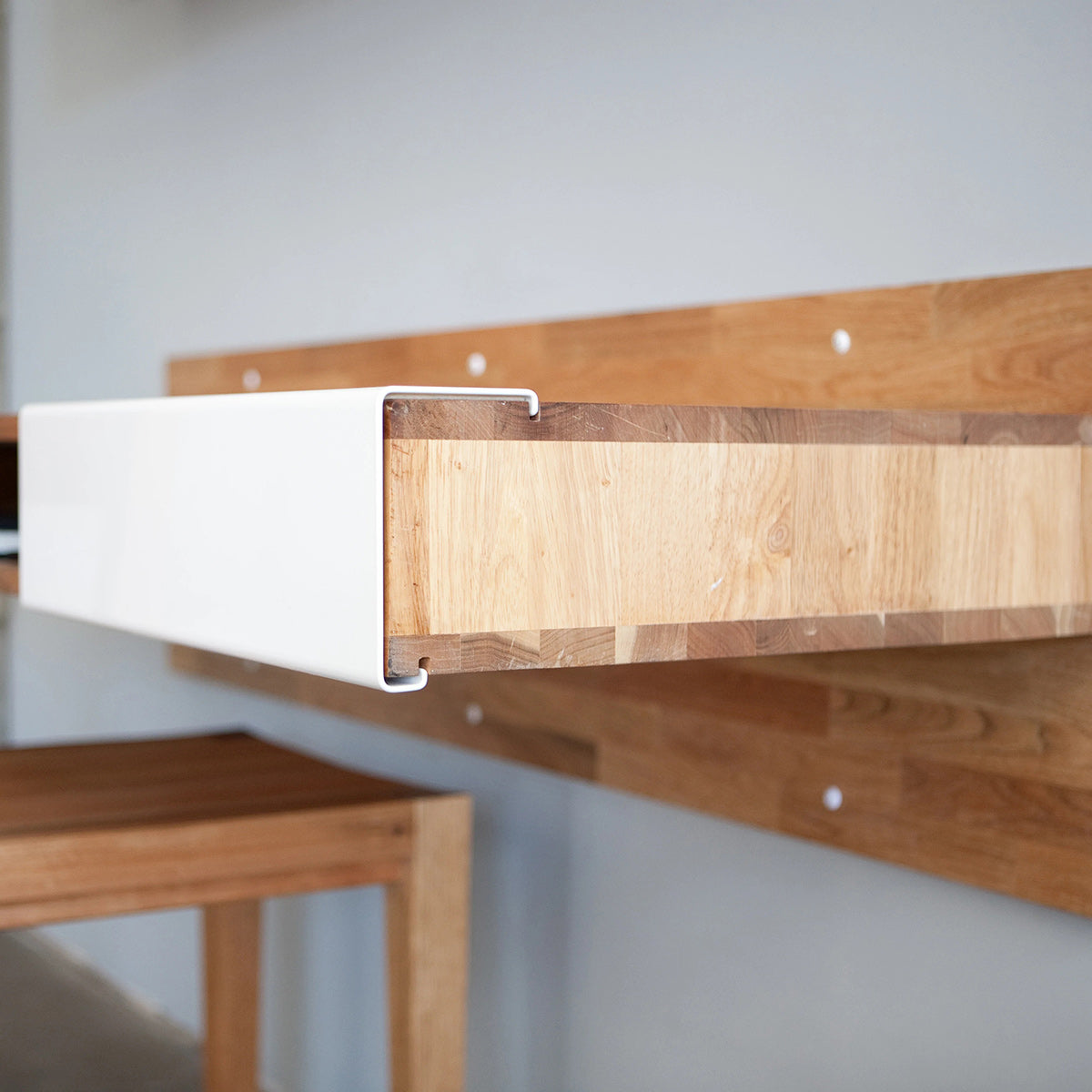 LAX Wall Mounted Desk by MASHstudios, showing closeup view of lax wall mounted desk in live shot.
