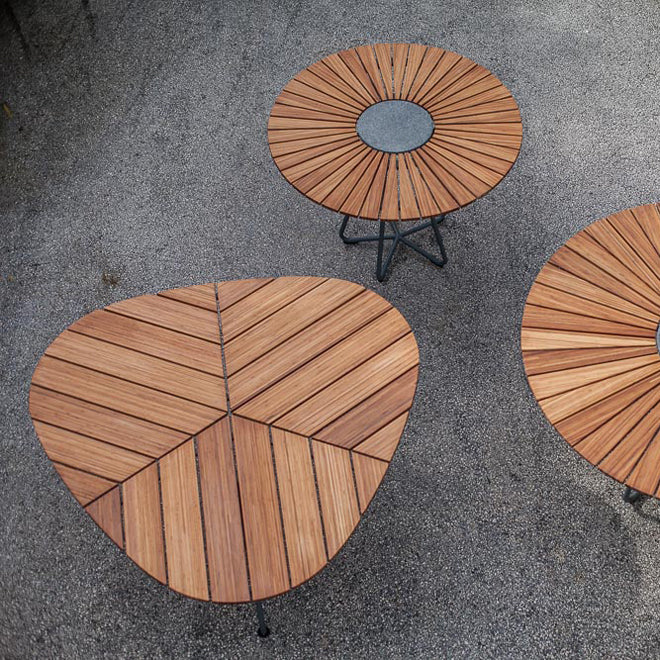 Leaf Outdoor Dining Table by Houe, showing leaf outdoor dining table with tables in live shot.