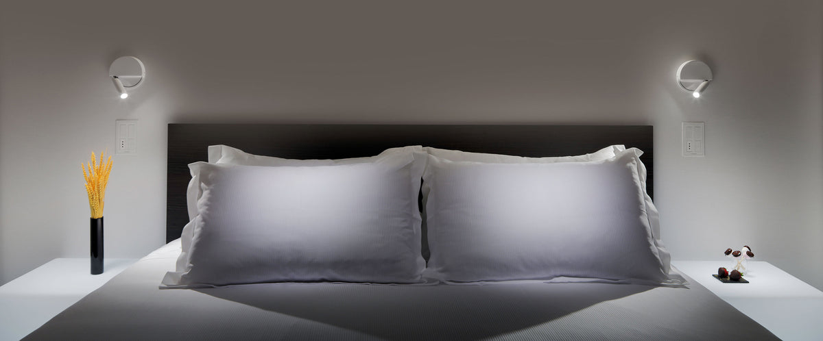Ledtube R Reading Wall Lamp by Marset, showing ledtube r reading wall lamps in live shot.