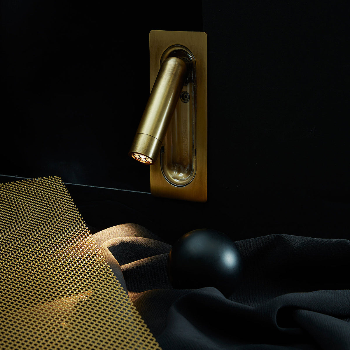 Ledtube Reading Mini Wall Lamp by Marset, showing ledtube reading mini wall lamp in live shot.