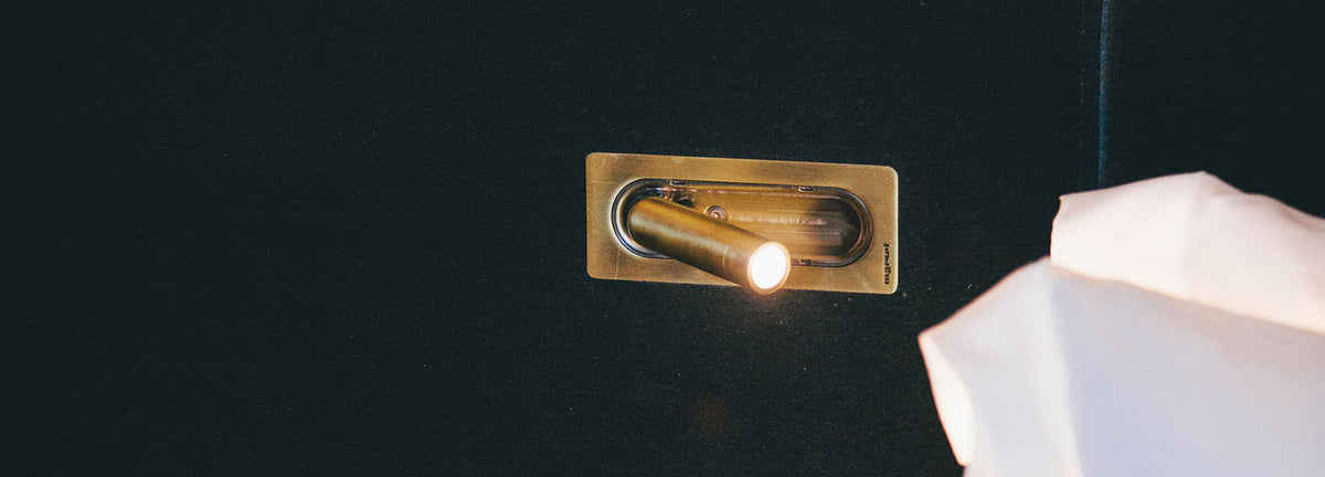 Ledtube RSC Reading Wall Lamp by Marset, showing ledtube rsc reading wall lamp in live shot.