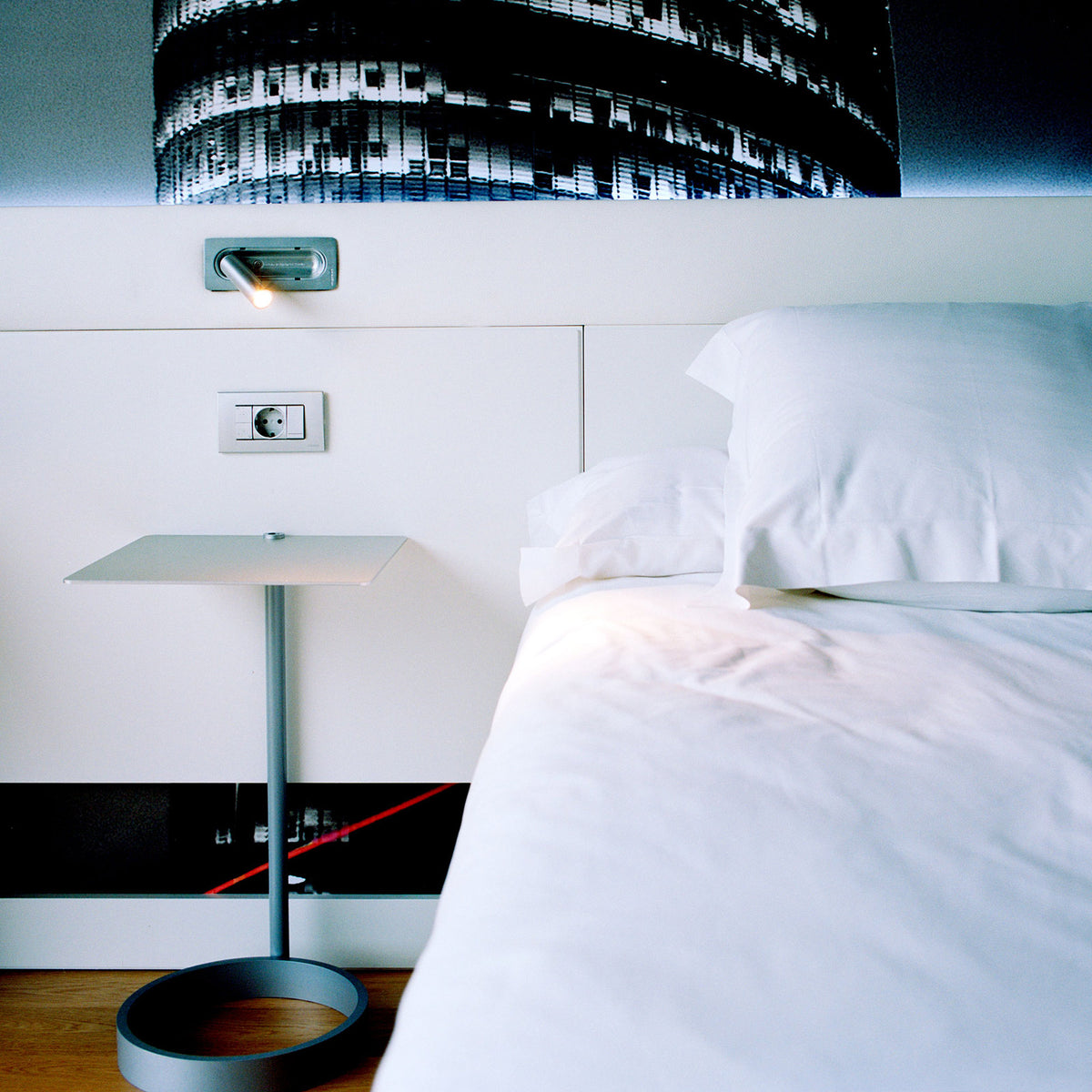 Ledtube RSC Reading Wall Lamp by Marset, showing ledtube rsc reading wall lamp in live shot.