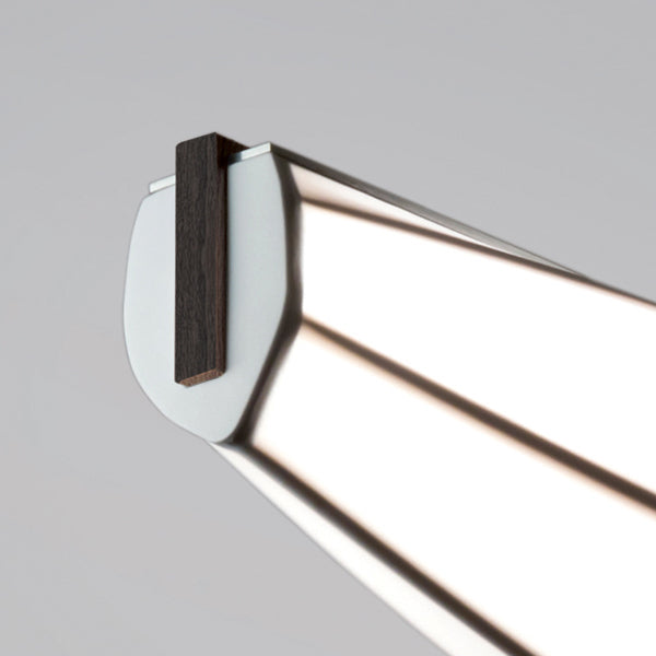 Lenis LED Linear Pendant by Cerno, showing closeup view of lenis led linear pendant in dark stained walnut wood.