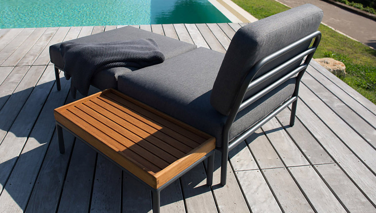 Level 2 End Table by Houe, showing level 2 end table with lounge chair in live shot.