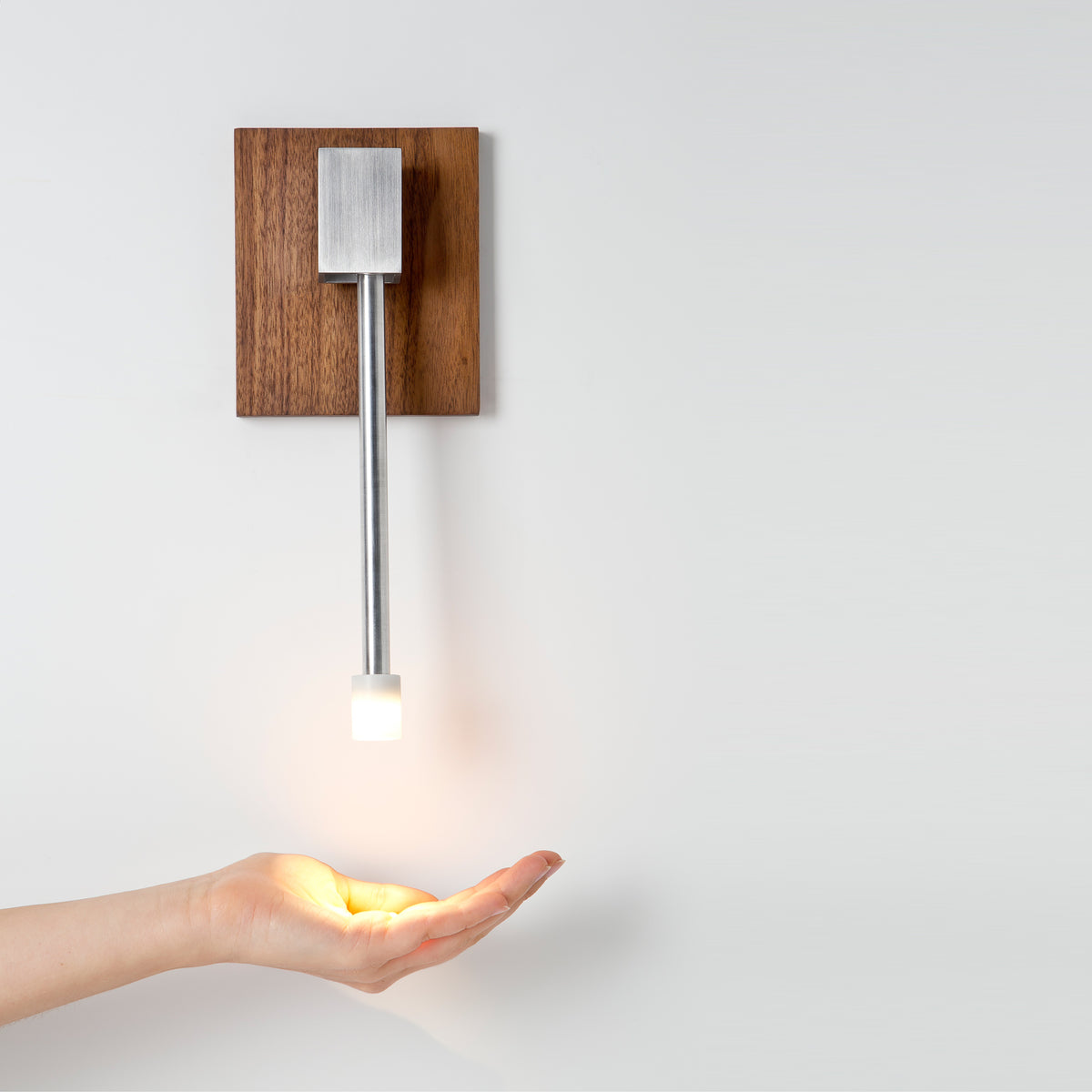 Libri Wall Mounting Kit by Cerno, showing libri wall walnut mounting kit in live shot.
