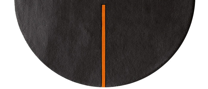 Lightsonic LC102 Rug by Second Studio, showing closeup view of lightsonic lc102 rug by second studio in black and rusty orange.