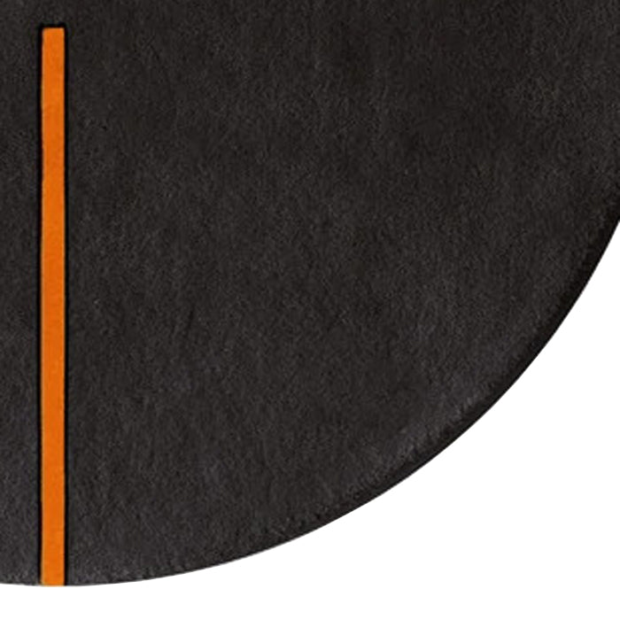 Lightsonic LC102 Rug by Second Studio, showing closeup view of lightsonic lc102 rug by second studio in black and rusty orange.