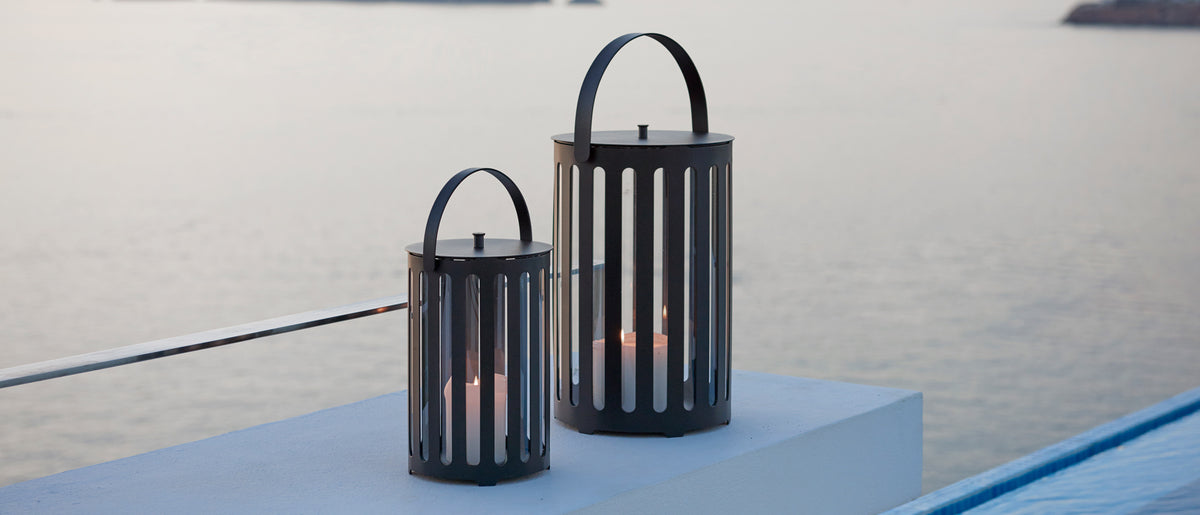 Lighttube Round Lantern by Cane-Line, showing lightube round lanterns in live shot.