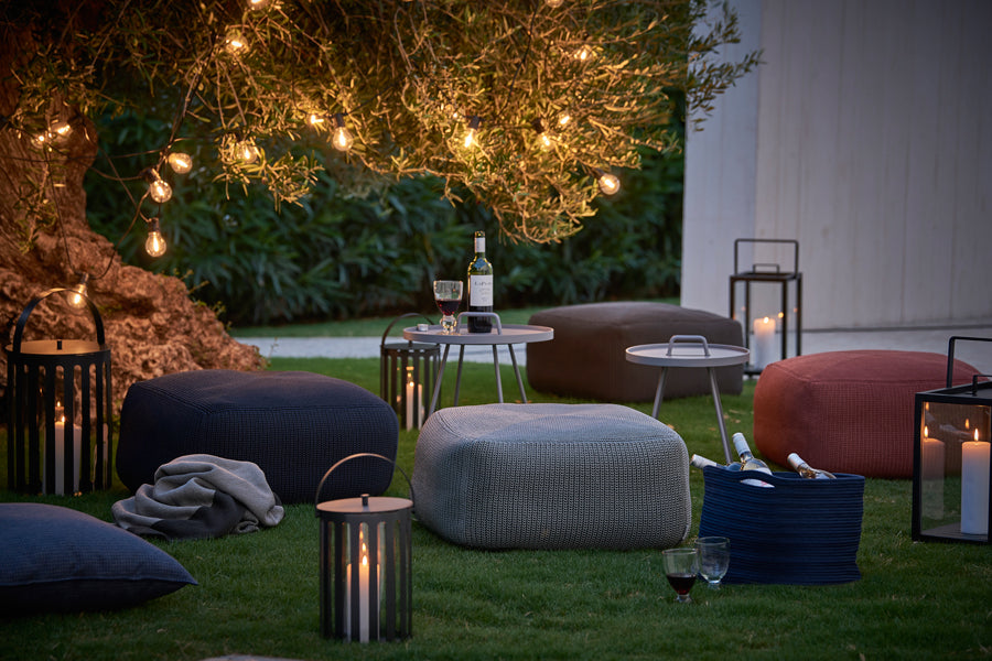 Lighttube Round Lantern by Cane-Line, showing lightube round lanterns in live shot.