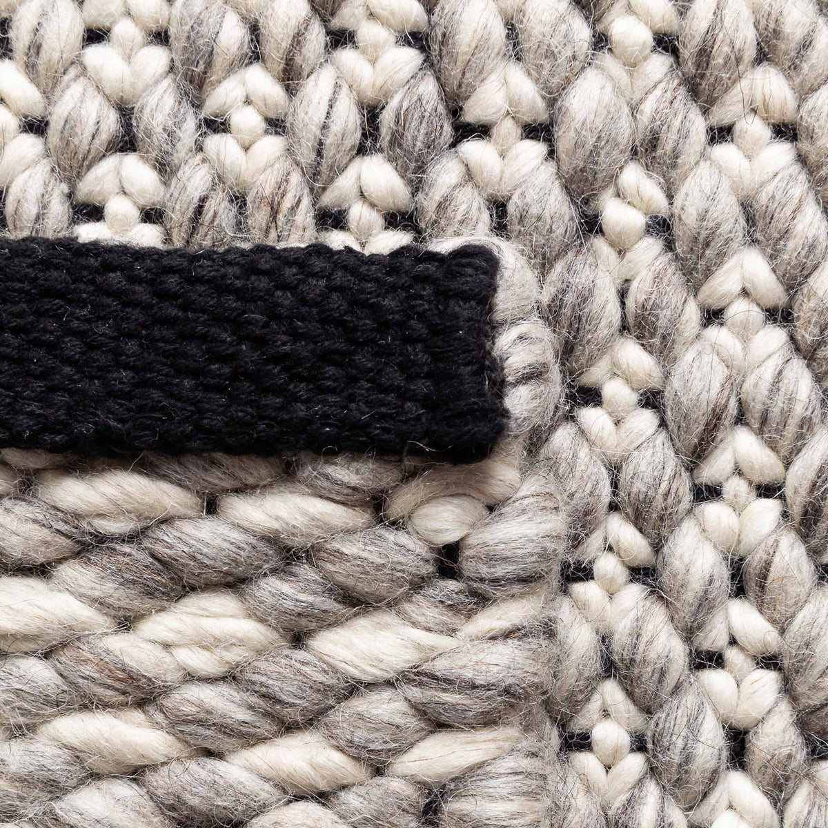 Solid 243.001.900 Hand Woven Rug by Ligne Pure, showing detail view of solid 243.001.900 hand woven rug.