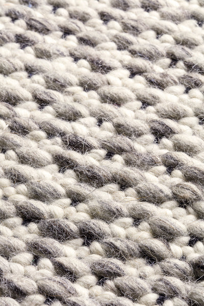 Solid 243.001.900 Hand Woven Rug by Ligne Pure, showing detail view of solid 243.001.900 hand woven rug.