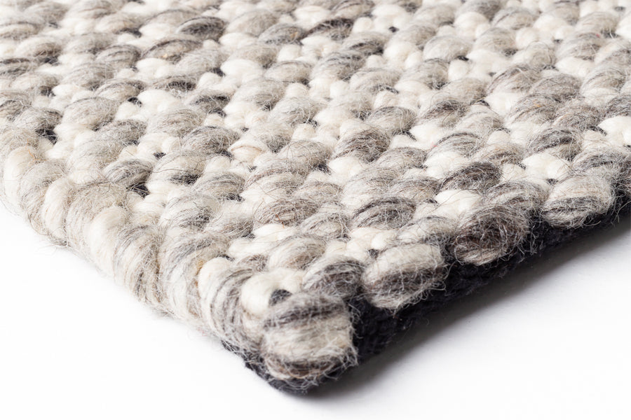 Solid 243.001.900 Hand Woven Rug by Ligne Pure, showing detail view of solid 243.001.900 hand woven rug.