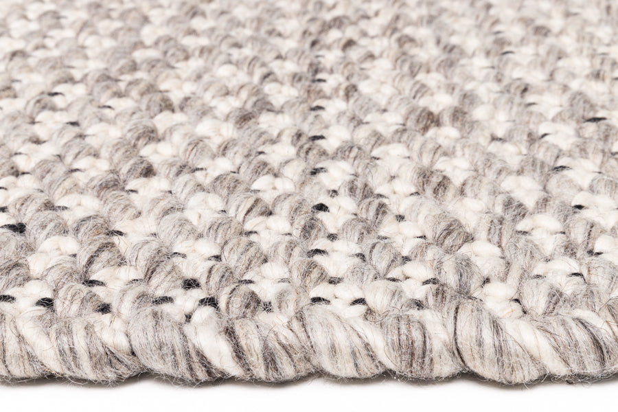 Solid 243.001.900 Hand Woven Rug by Ligne Pure, showing detail view of solid 243.001.900 hand woven rug.