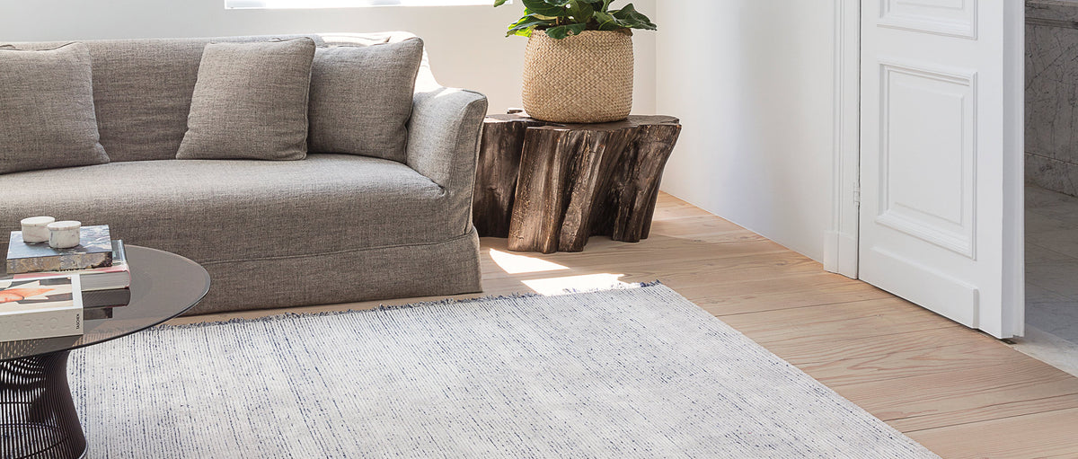 Torrent 247.001.500 Hand Woven Rug by Ligne Pure, showing torrent 247.001.500 hand woven rug in live shot.