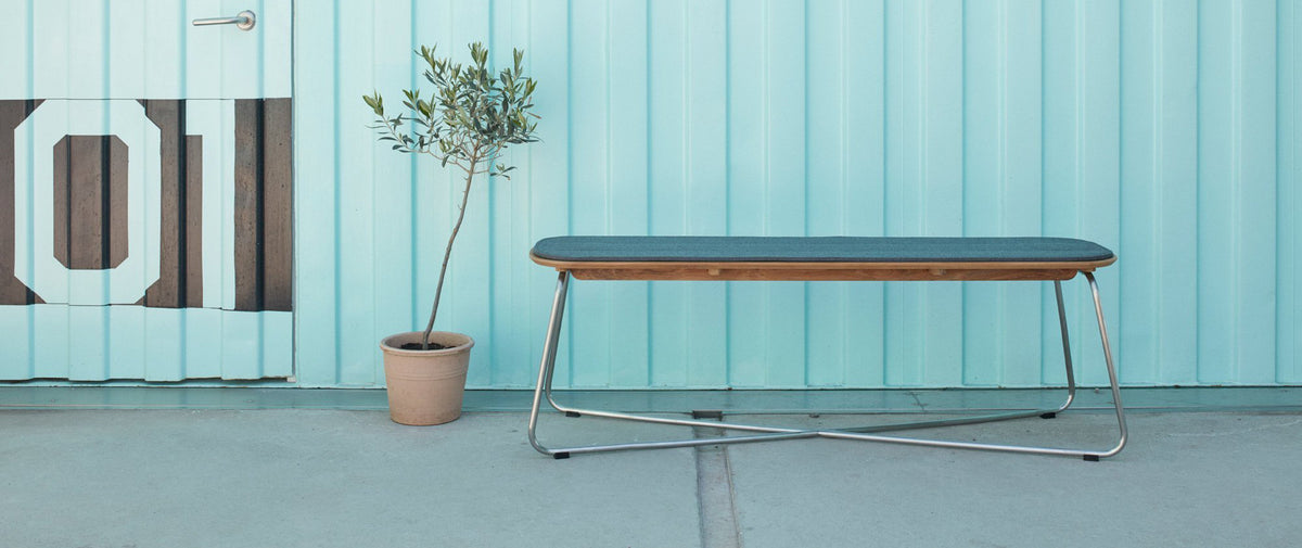 Lilium Teak Bench by Skagerak, showing lilium bench in live shot.