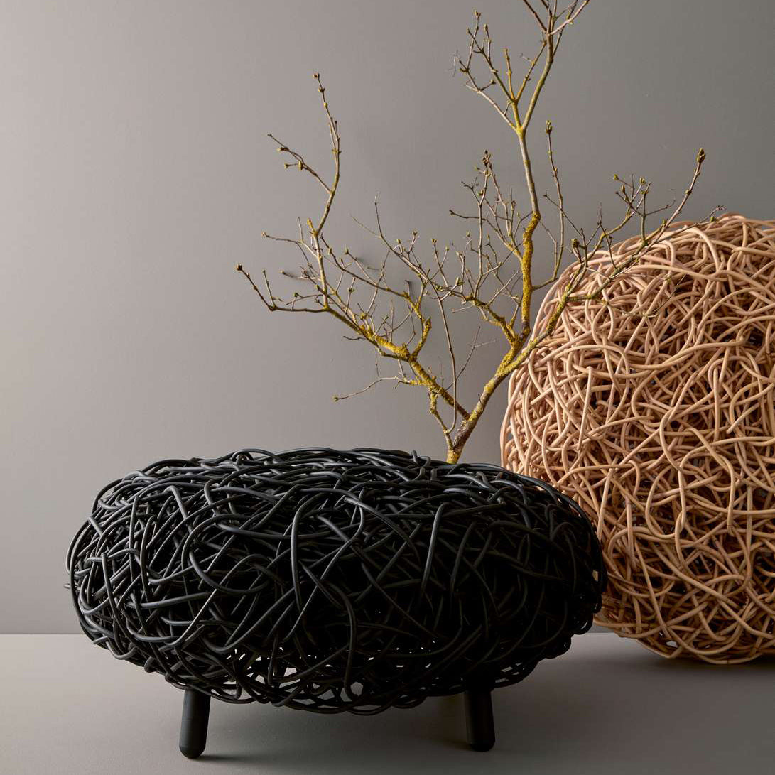Loop Footstool by Cane-Line, showing loop footstools in live shot.