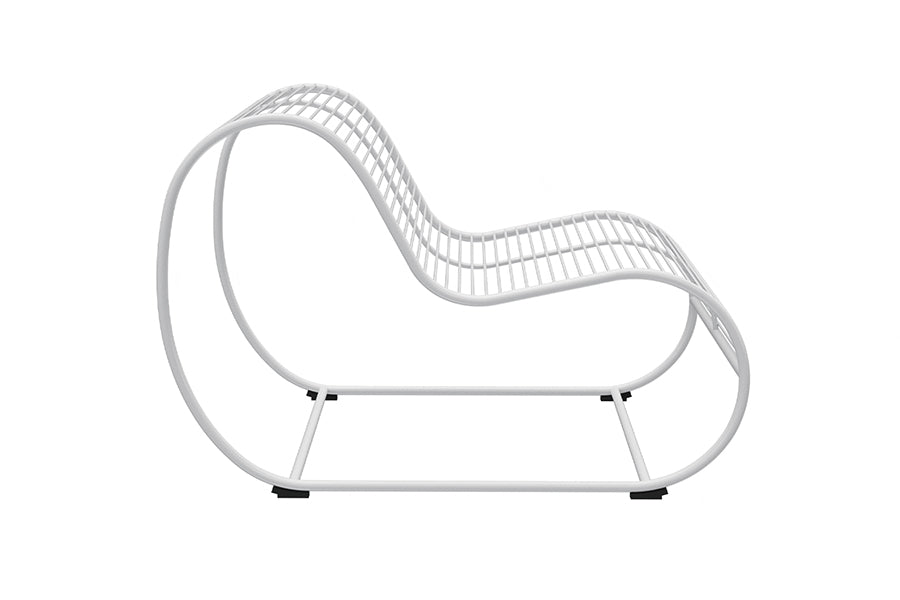 Loop Lounge Chair by Bend, showing side view of loop lounge chair in white metal frame.