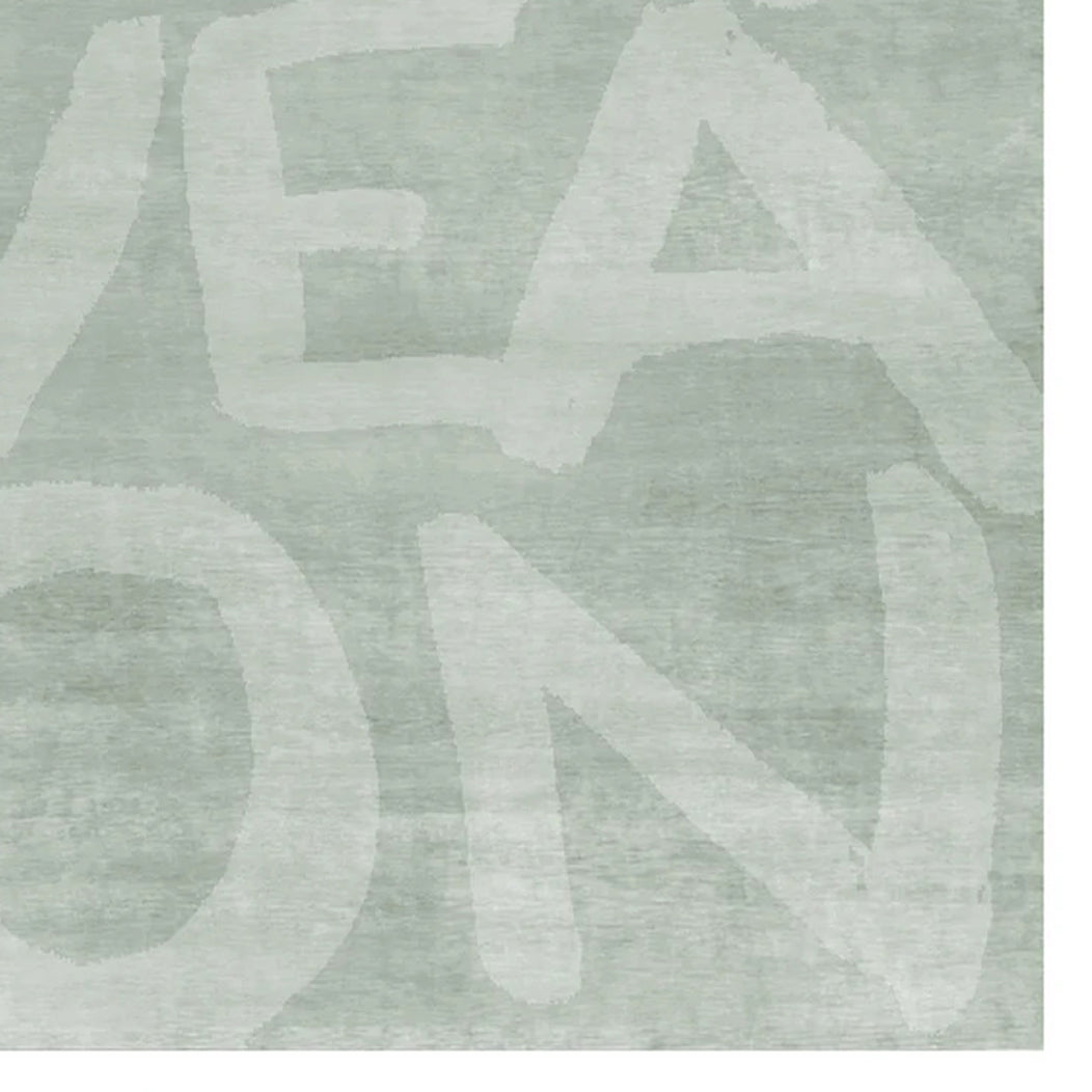 Love LE35 Rug by Second Studio, showing closeup view of love le35 by second studio in subtle green.