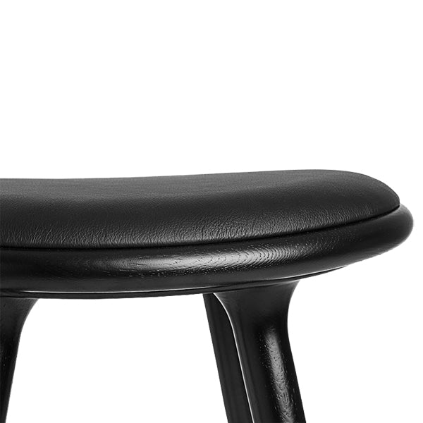 Low Stool by Mater, showing close up of the stool top.
