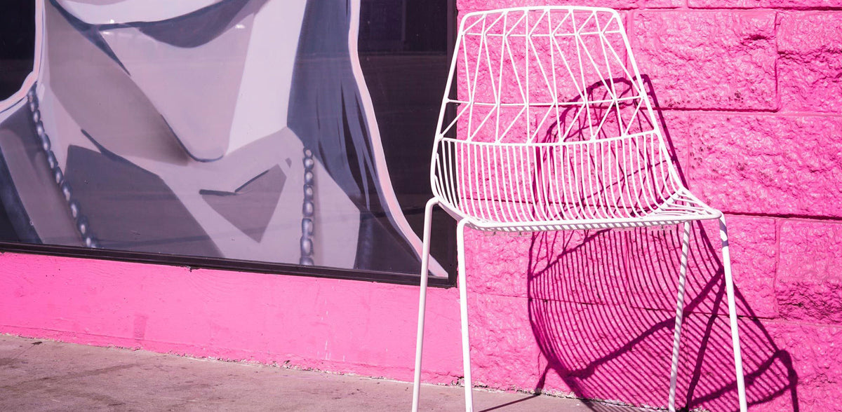 Lucy Stacking Chair by Bend, showing lucy stacking chair in live shot.