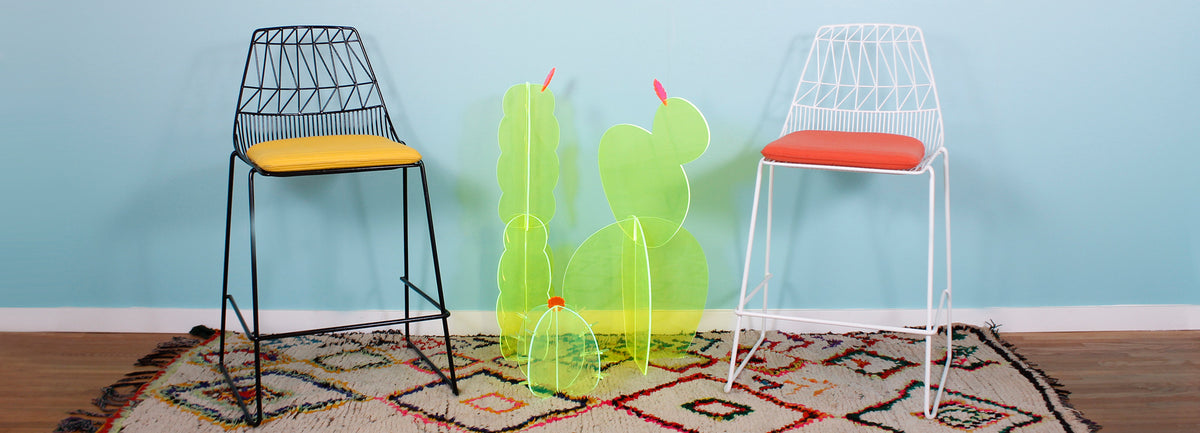 Lucy Stacking Stool by Bend, showing lucy stacking stool with seatpads in live shot.