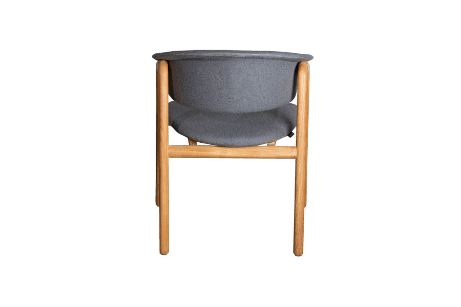 Luna Dining Chair by Cane-Line, showing back view of luna dining chair in teak wood/grey airtouch cushion.