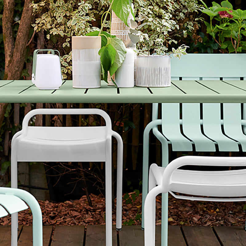 Luxembourg Stool by Fermob, showing luxembourg stool with chairs and table in live shot.