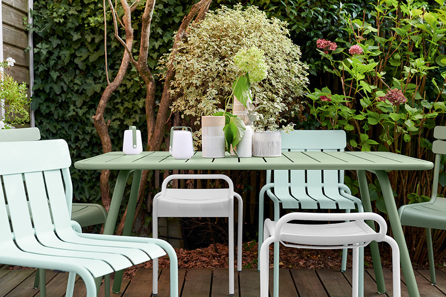 Luxembourg Stool by Fermob, showing luxembourg  stool with chairs and table in live shot.