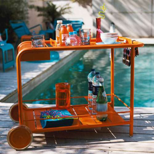 Luxembourg Bar Cart with Wheels by Fermob, showing bar with wheels in live shot.