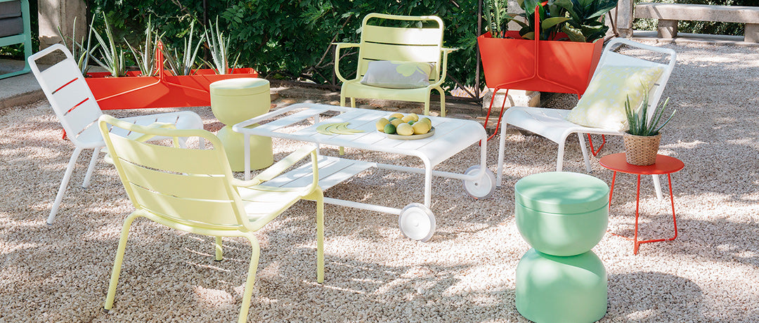 Luxembourg Lounge Chair by Fermob, showing luxembourg lounge chair with tables in the live shot.