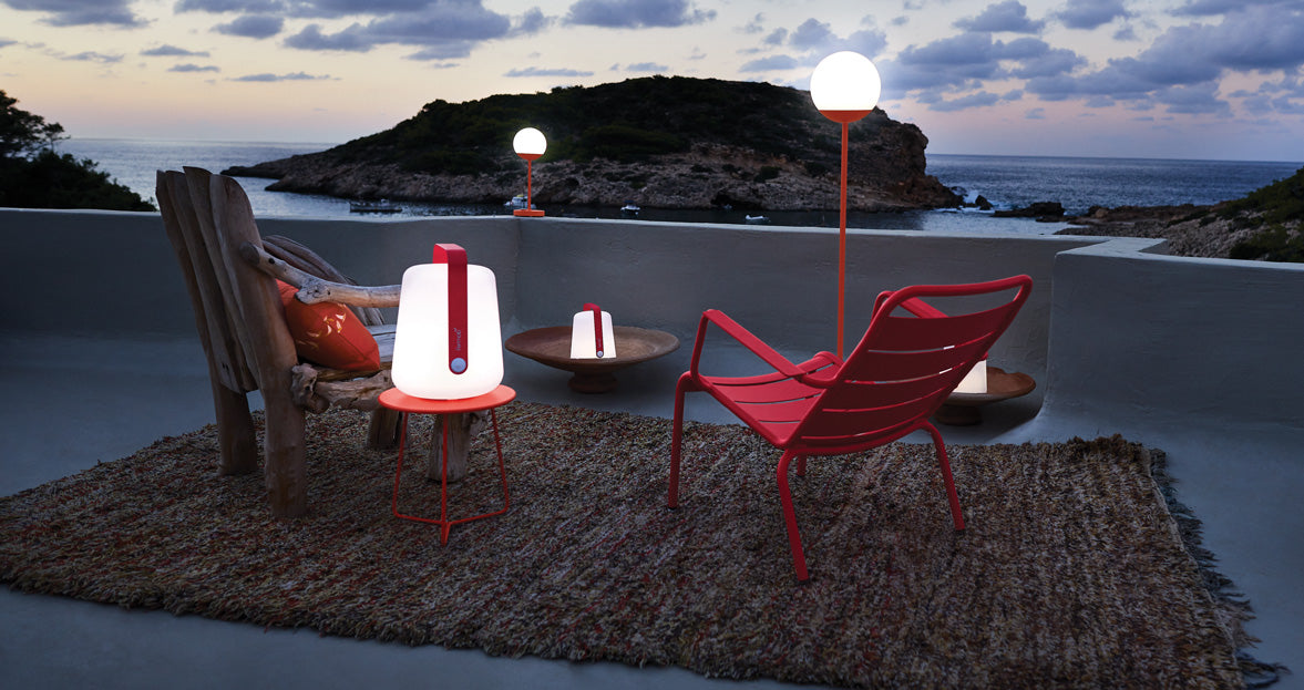 Luxembourg Low Armchair by Fermob, showing back view of armchair in the live shot.