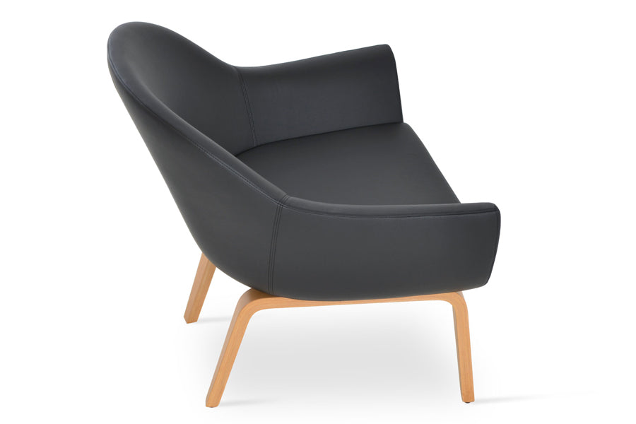 Madison Plywood Arm Chair by Sohoconcept, showing angle view of chair in black leatherette with walnut finish.