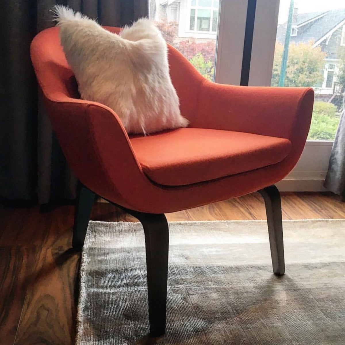 Madison Plywood Arm Chair by Sohoconcept, showing angle view of plywood arm chair in live shot.