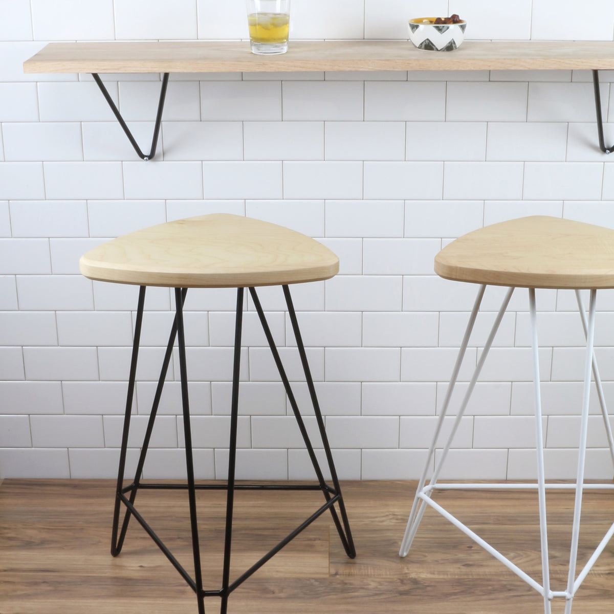 Madison Stool by Tronk Design, showing madison stools in live shot.
