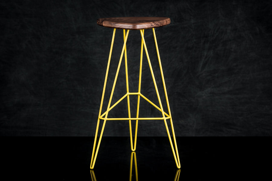 Madison Stool by Tronk Design, showing madison stool in live shot.