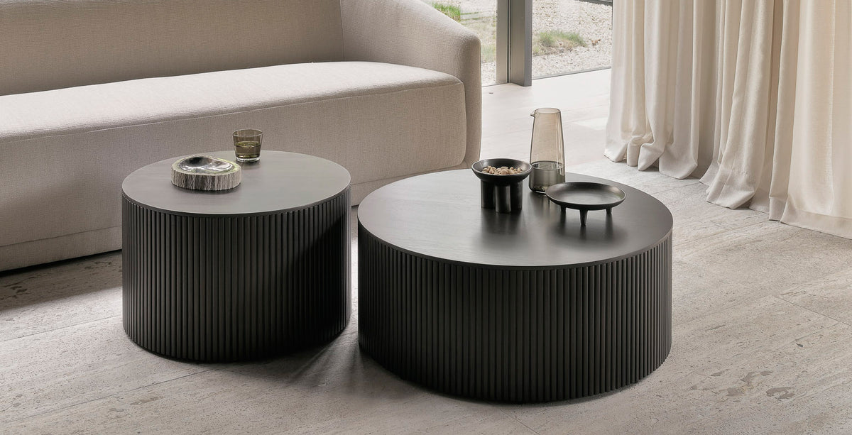 Roller Max Coffee Table by Ethnicraft, showing roller max coffee tables in live shot.