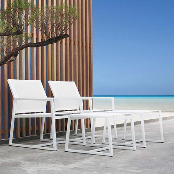 Allux Casual Armchair by Mamagreen, showing two casual armchairs and two footrests in live shot.