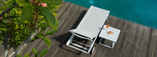 Allux Side Table by Mamagreen, showing medium side table and allux lounger in live shot.