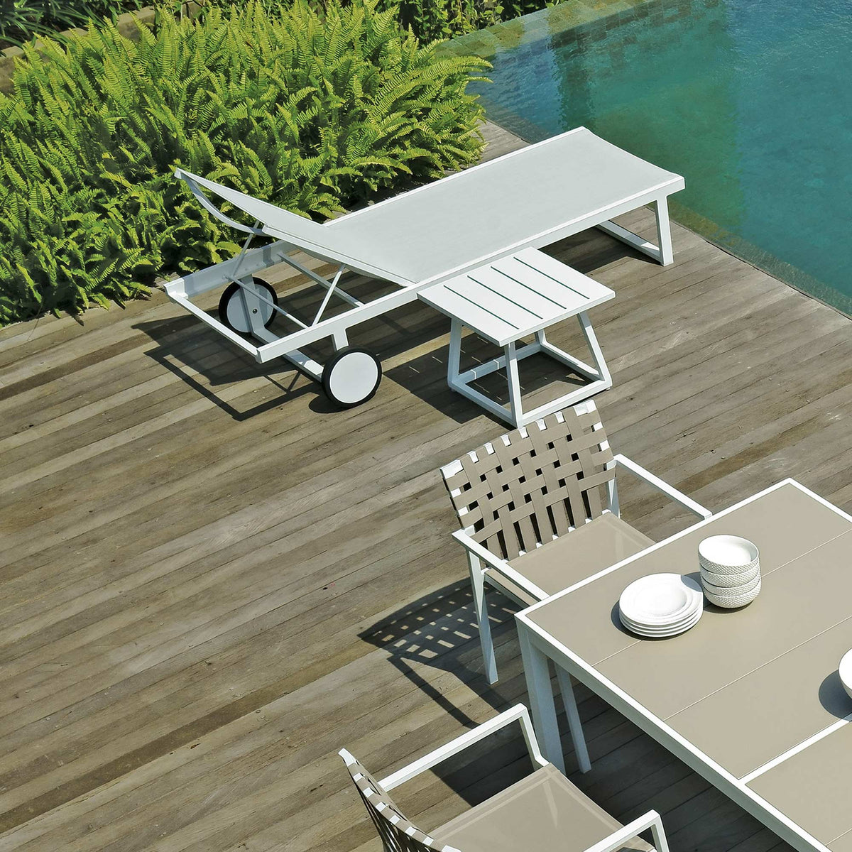 Allux Side Table by Mamagreen, showing medium side table and allux lounger in live shot.