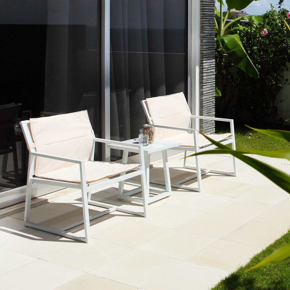 Allux Side Table by Mamagreen, showing small side table and allux chair in live shot.
