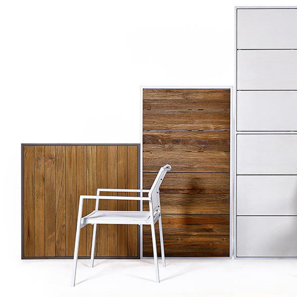 Allux Stacking Armchair by Mamagreen, showing stackable armchairs in live shot.