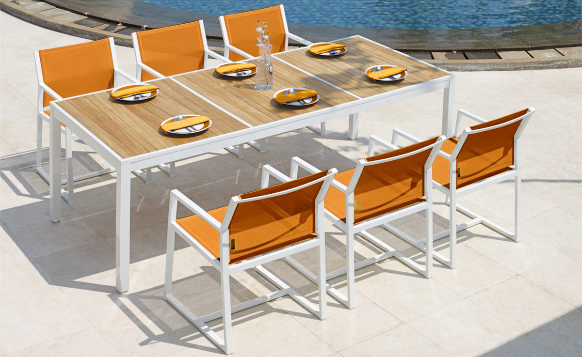 Allux Wood Dining Table by Mamagreen, showing allux wood dining table and carver chairs in live shot.