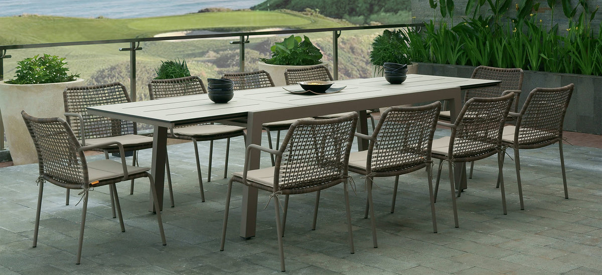 Baia HPL Aluminum Extendable 90.5" Dining Table by Mamagreen, showing baia hpl aluminum extendable 90.5" dining table with anda chair woven aluminum in live shot.