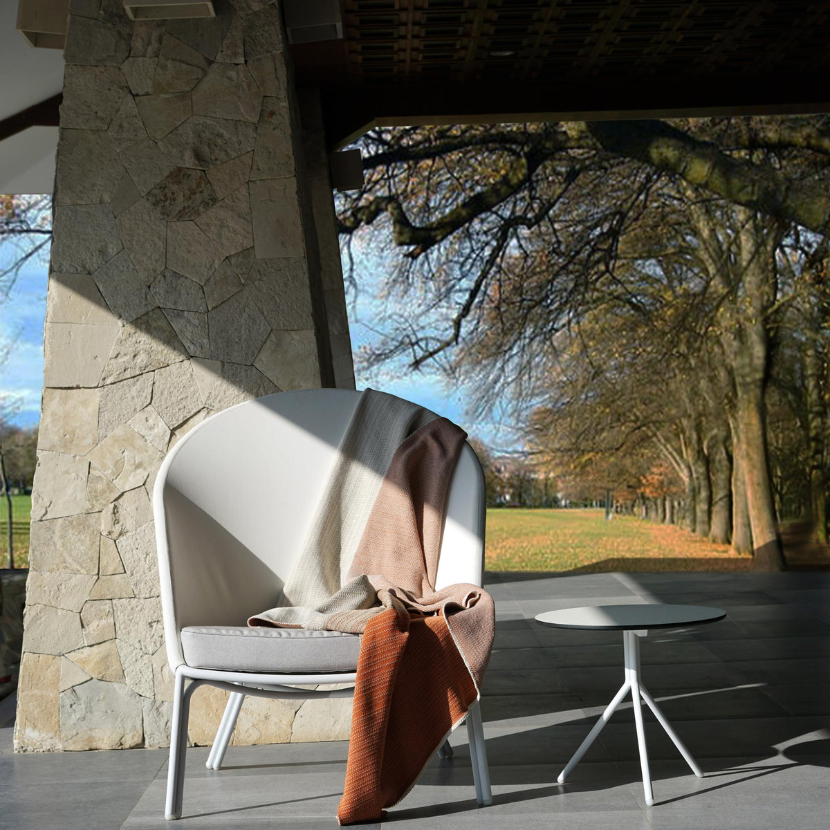 Bono HPL Aluminum Side Table by Mamagreen, showing bono hpl aluminum side table with zupy high back chair in live shot.