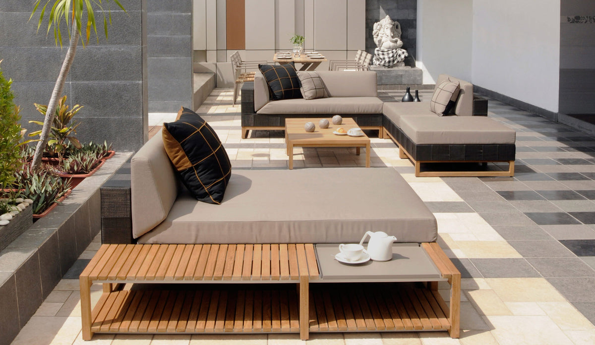 Ekka Ottoman by Mamagreen, showing ekka ottoman with ekka right hand sectional, ekka sectional chaise, ekka sectional seat, ekka long table and ekka sectional coffee table in live shot.