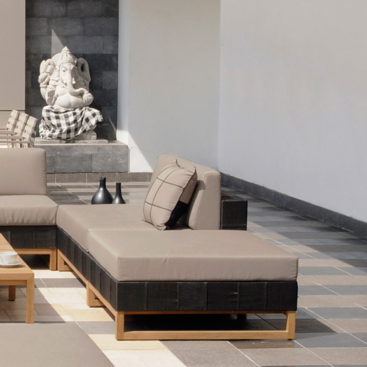 Ekka Ottoman by Mamagreen, showing ekka ottoman with ekka sectional seat in live shot.