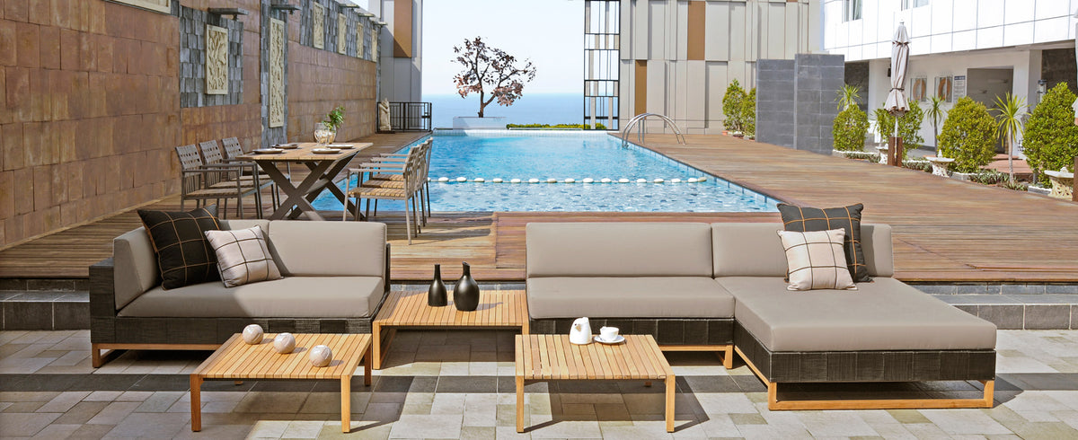 Ekka Sectional Chaise by Mamagreen, showing ekka sectional chaise with ekka sectional seat and coffee table in live shot.